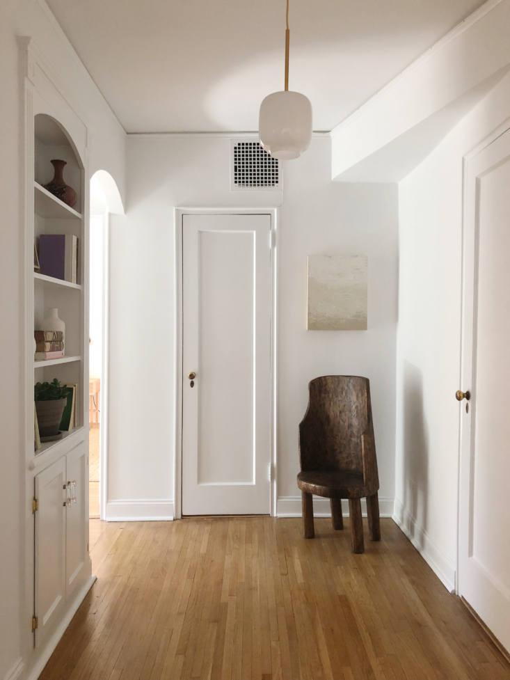 Flattering light is a staging essential. In a hall at 40 Prospect Park West, the Hoveys hung a current favorite of theirs, West Elm’s Sculptural Milk Glass Pebble Pendant, $79.